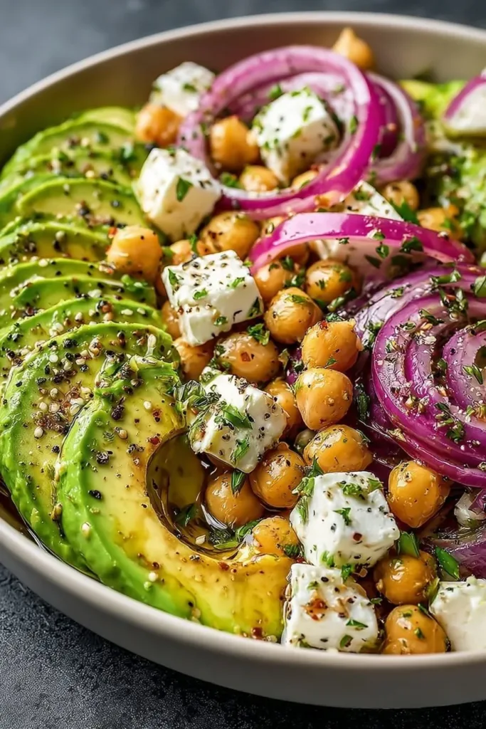 Chickpea Feta Avocado Salad with fresh vegetables and herbs