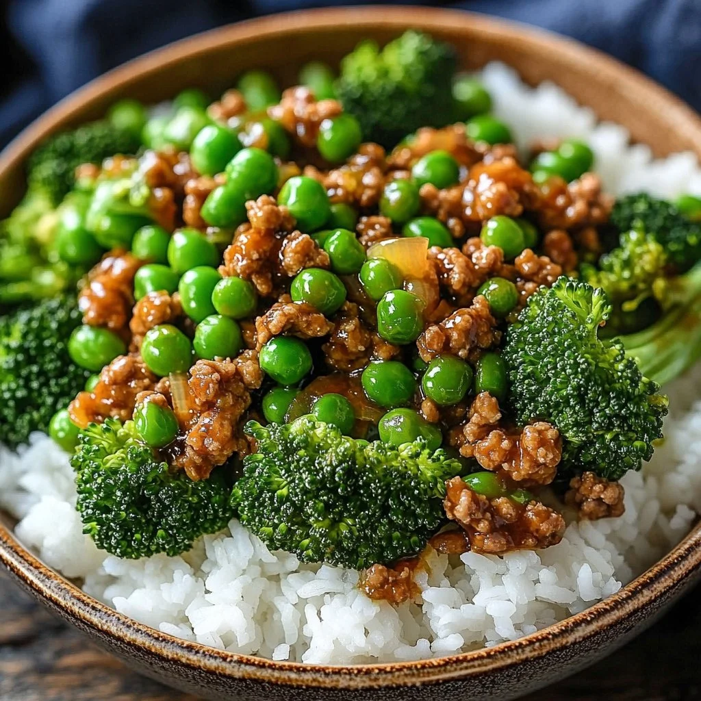 Delicious teriyaki ground turkey with broccoli and peas served in a bowl