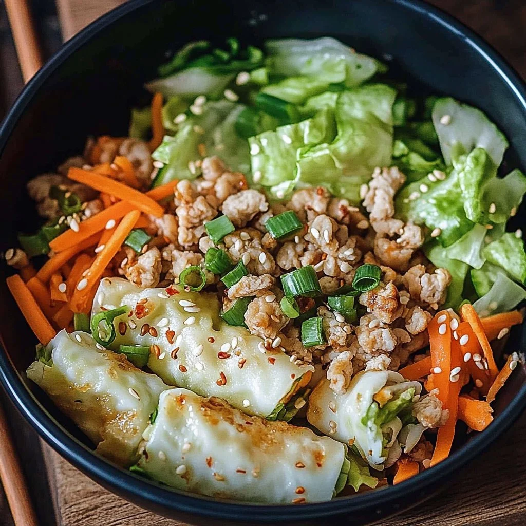 Delicious egg roll in a bowl with colorful vegetables and savory sauce